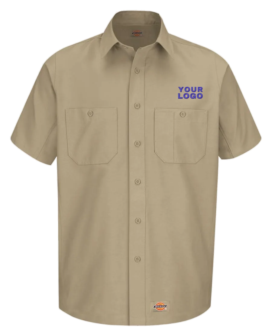 Khaki Dickies short sleeve work shirt in front of a black soft shell jacket, each with a YOUR LOGO placeholder