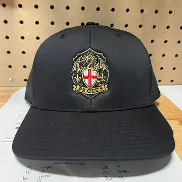 Proof photo 4 of 128: a customer logo stitched on a test hat