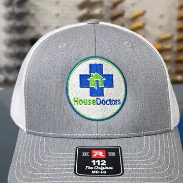 Proof photo 5 of 128: a customer logo stitched on a test hat