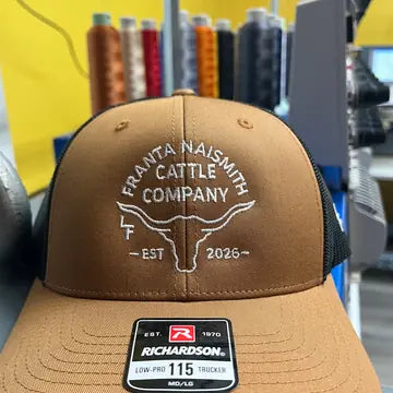 Proof photo 6 of 128: a customer logo stitched on a test hat
