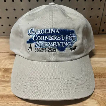 Proof photo 7 of 128: a customer logo stitched on a test hat