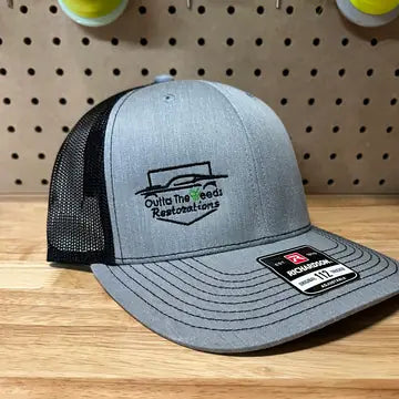 Proof photo 13 of 128: a customer logo stitched on a test hat