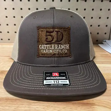 Proof photo 16 of 128: a customer logo stitched on a test hat