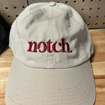 Proof photo 21 of 128: a customer logo stitched on a test hat
