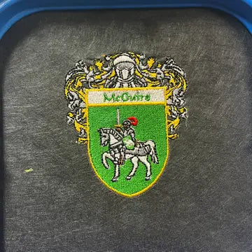 Proof photo 24 of 128: a customer logo stitched on a test hat